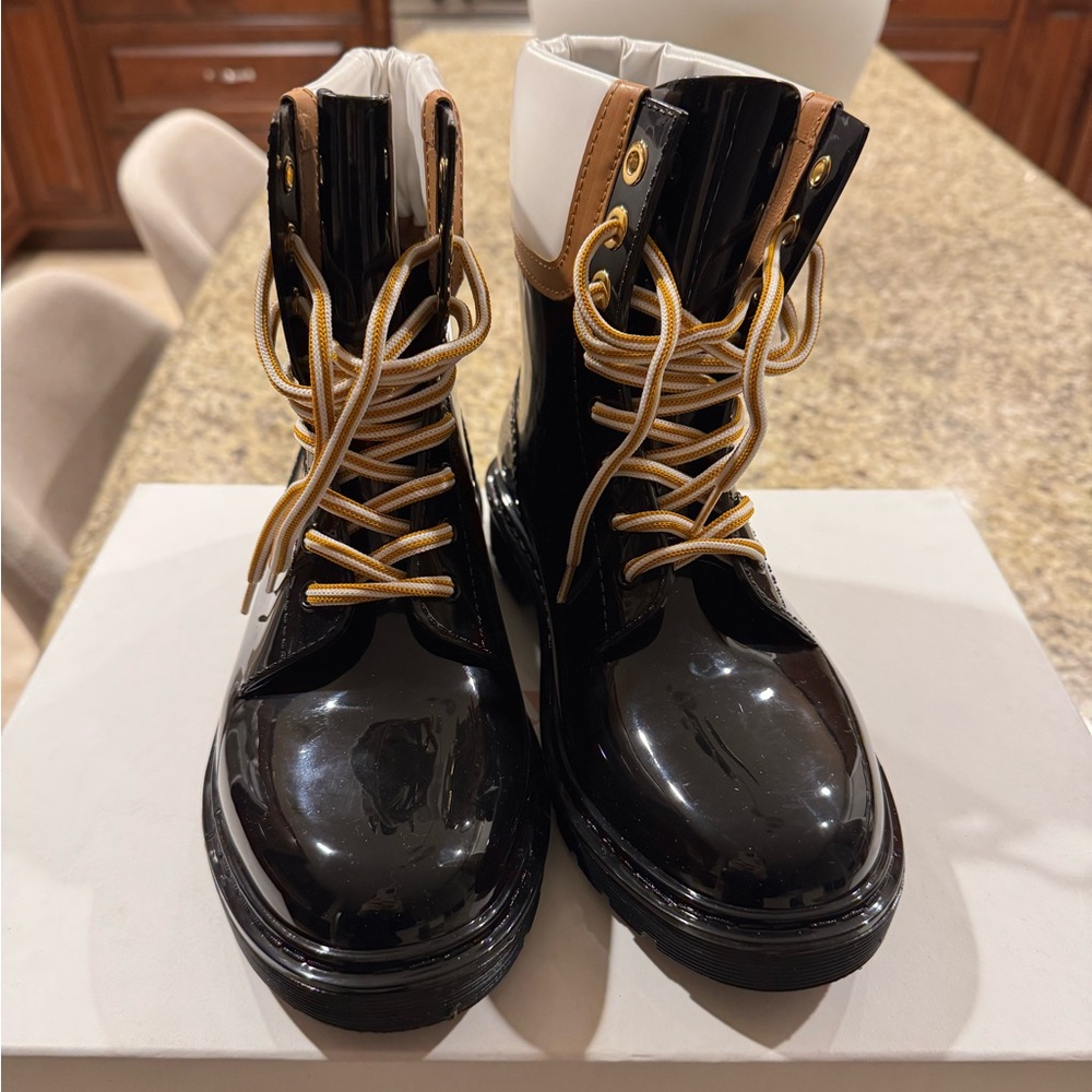 See By Chloe Rainboots